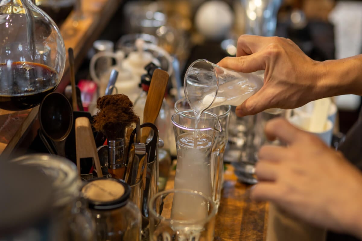 bartender making drinks at a bar