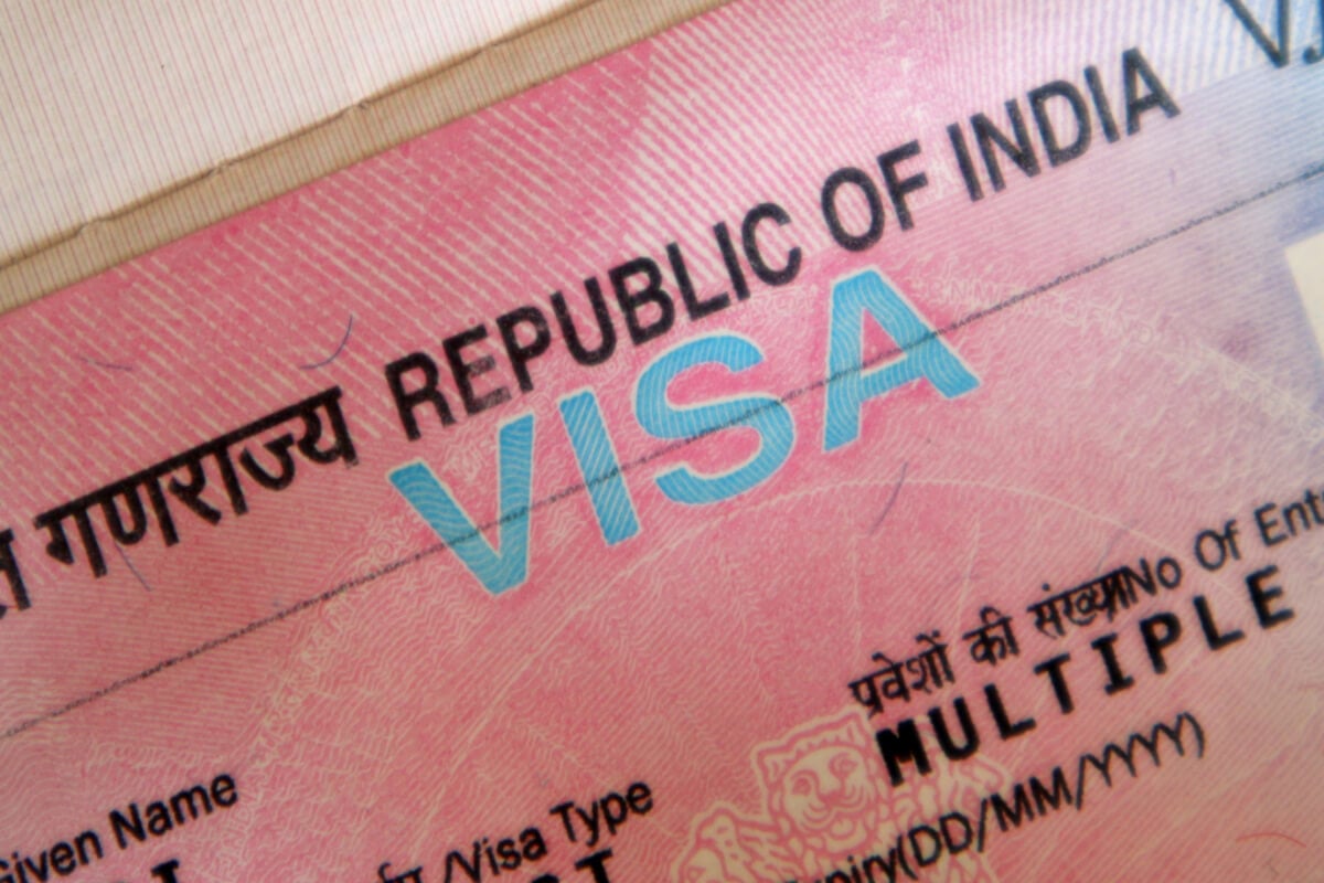 pink indian visa page backpacking india