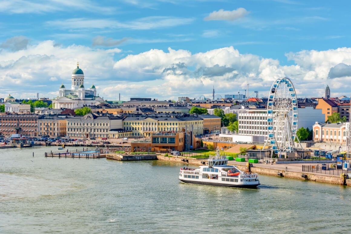 boats on a river overlooking Helsinki's city centre