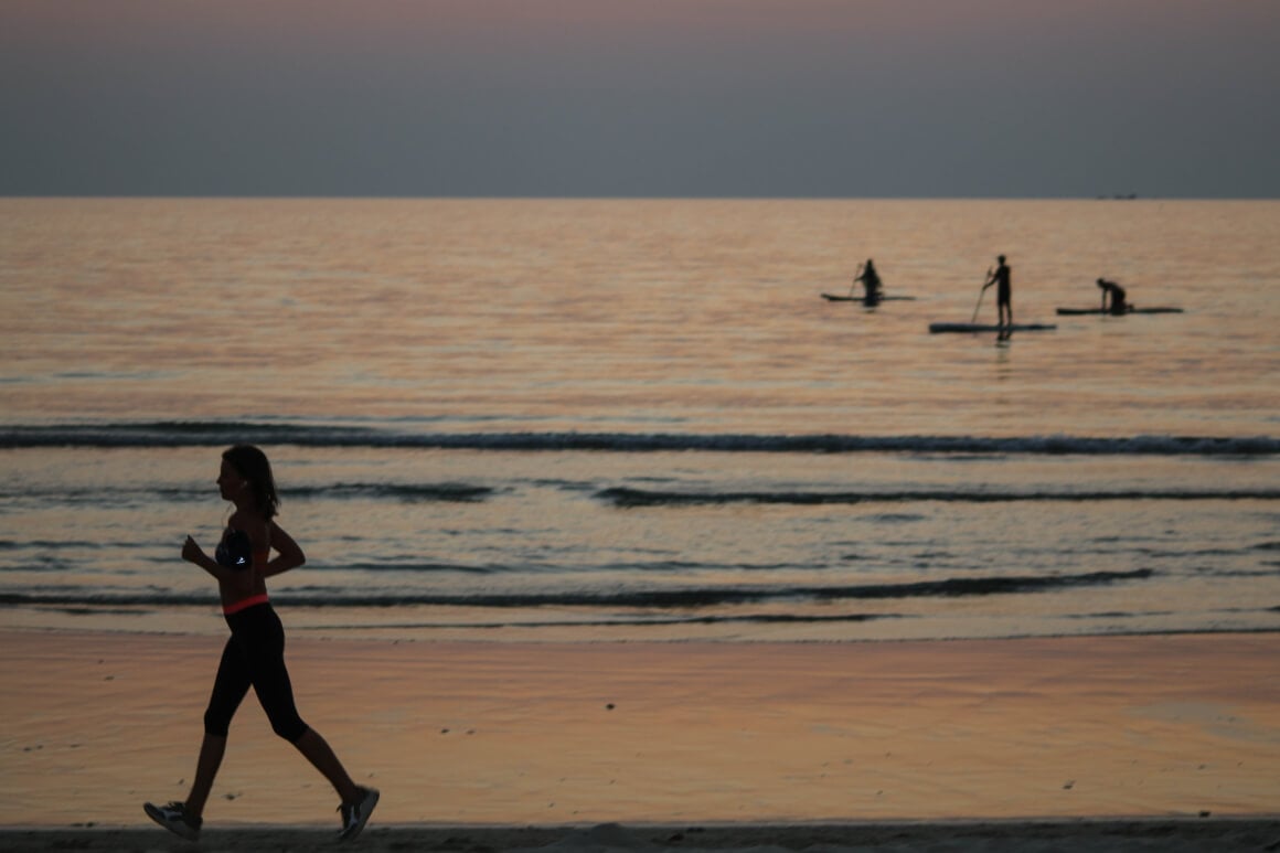Woman walking in the beach Thailand