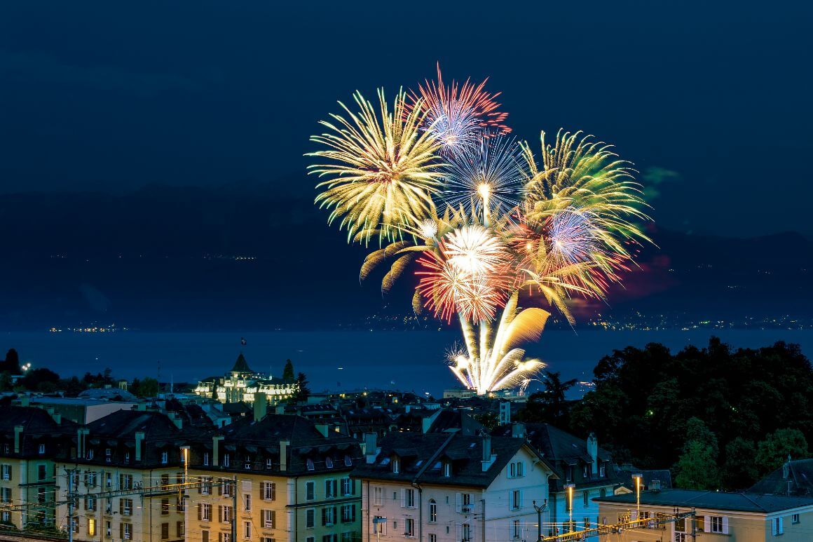 Bursts of firework in the city of Lausanne during Fete Nacional Suisse 