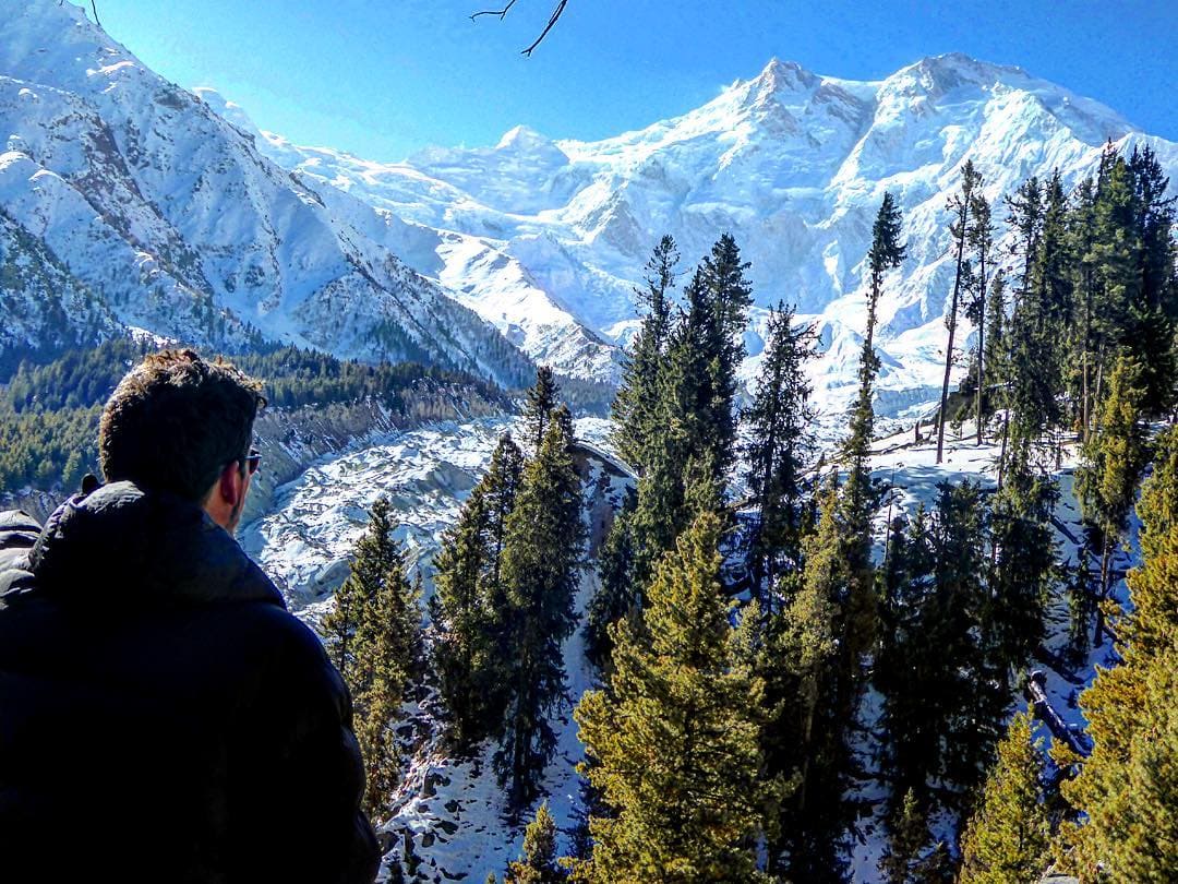 Will looking out over a snow covered mountainous landscape in Pakistan