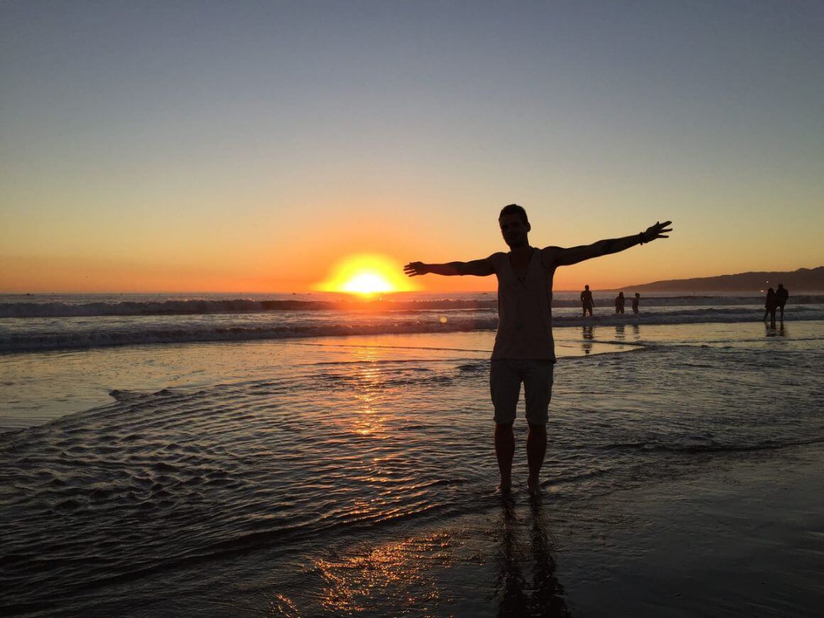 Person at the beach at sunset
