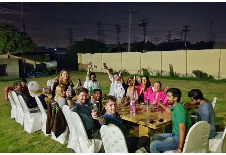 photo of a tour group led by will having dinner in lahore pakistan