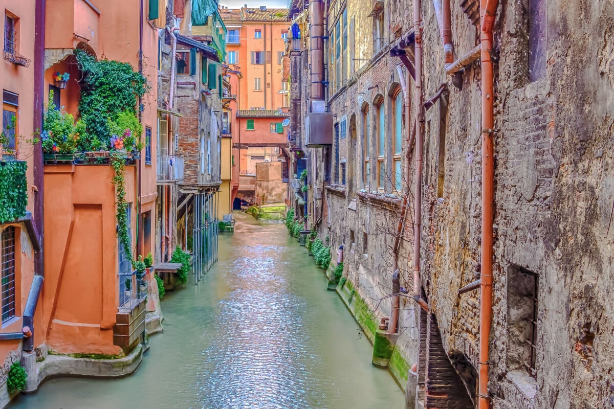 Bologna's Channel River between historically stylish buildings.