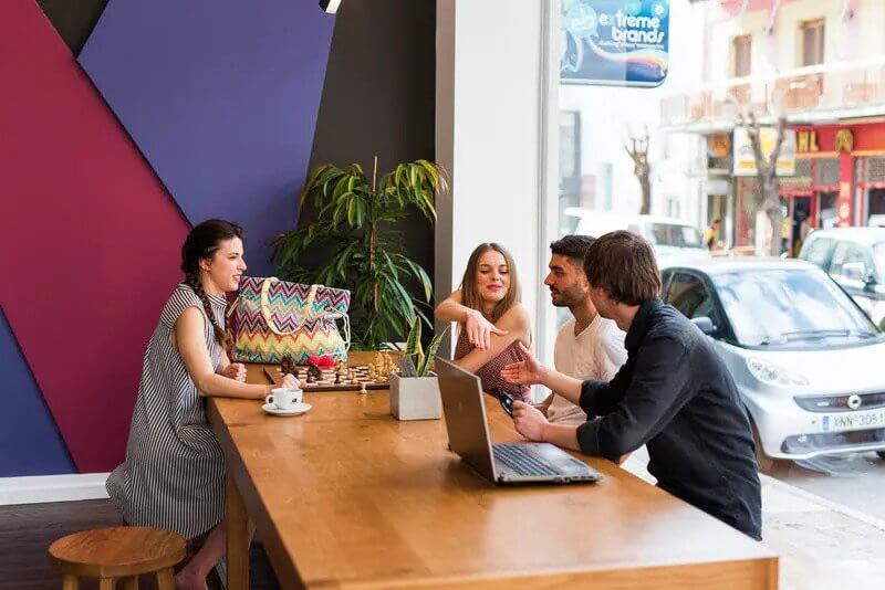 Digital nomads at the breakfast table, Cocoon City Hostel