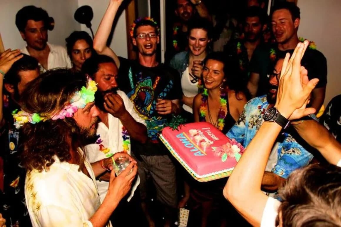 Goodnight Lisbon Hostel Best Party Hostel in Lisbon. Travellers celebrating a birthday with cake and party dress ups