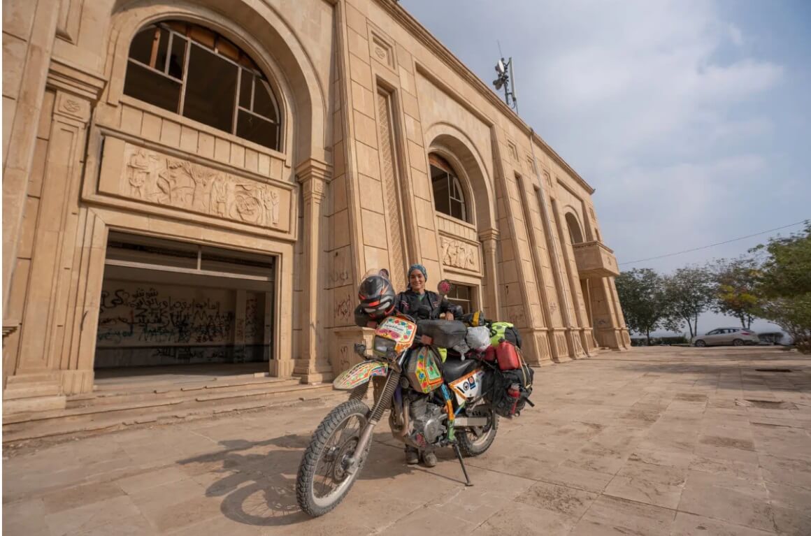 Alex and her Pakistani-truck-art motorbike questing around Iraq.