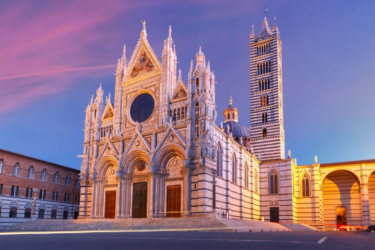 Duomo di Siena (Siena Cathedral), it's gorgeous façade, and hazy dusk light.