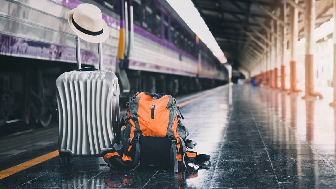 essential travel packing luggage, bag and hat