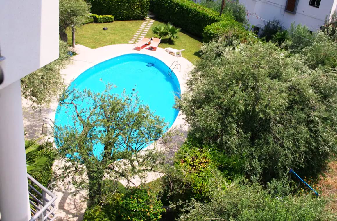 Pool view from a charming apartment in Letojanni