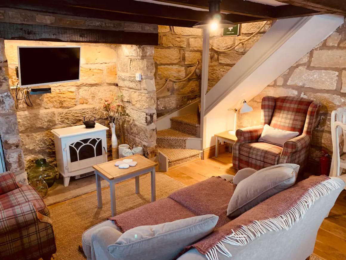 Living area at Fleur Cottage Airbnb