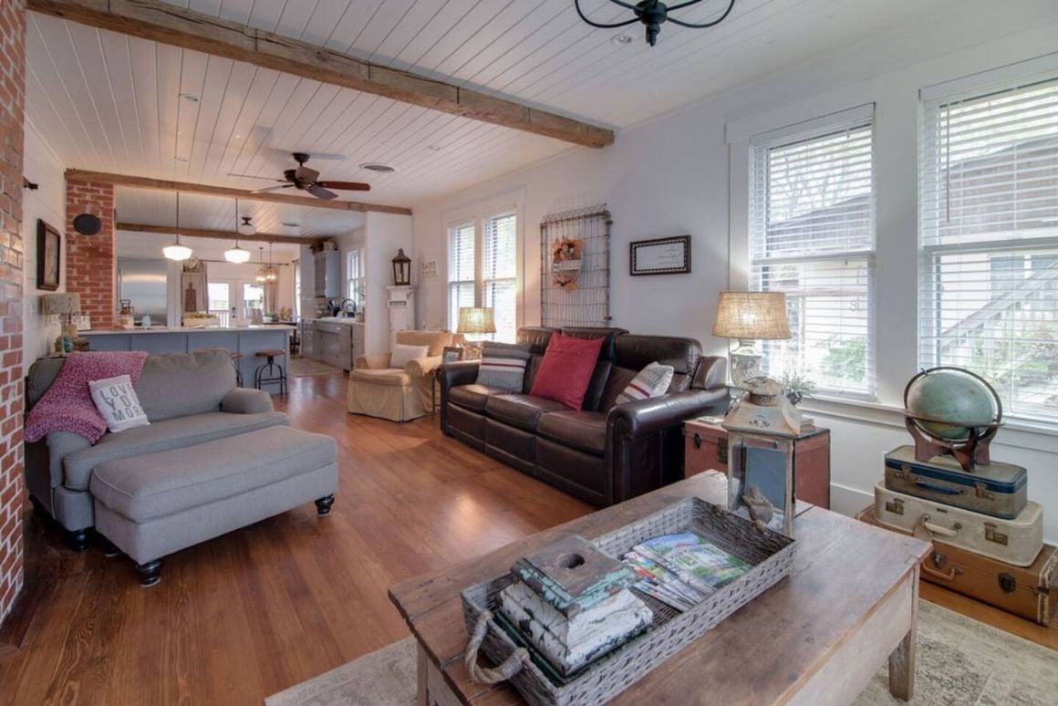 The living area with couches and furniture at an Airbnb in Fredericksburg 
