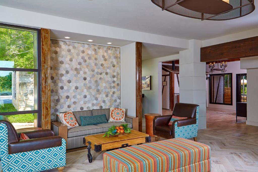 A communal space with colorful furniture at Fredericksburg Inn and Suites