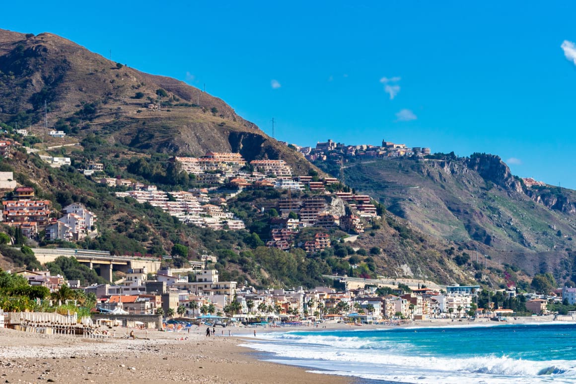 Letojanni Taormina coastline with mountain views 