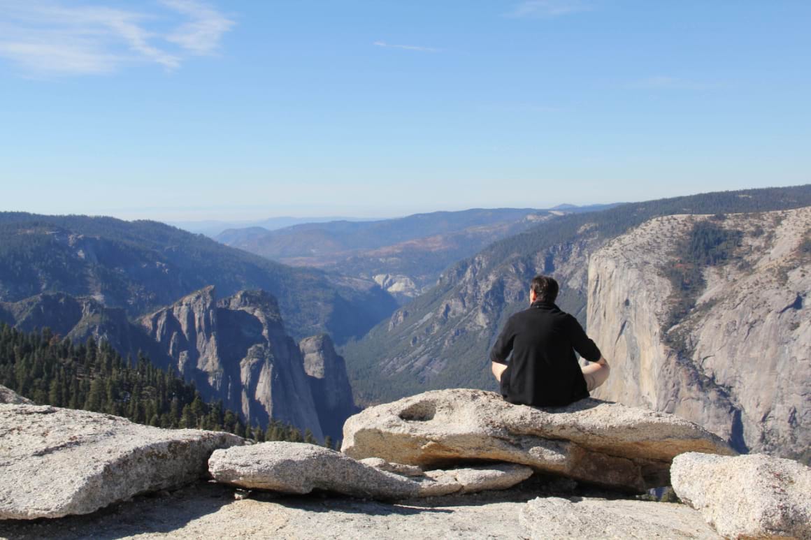 Meditating and the view of a valley California