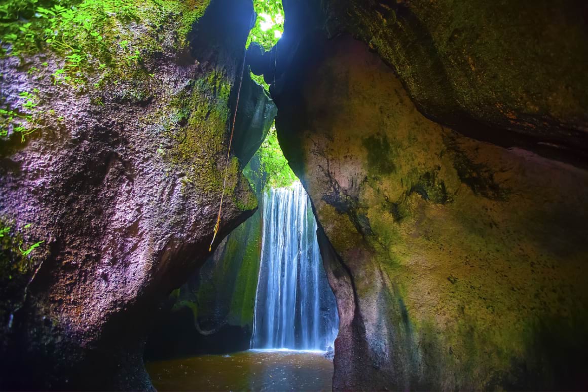 Marvel at the Tukad Cepung Waterfall