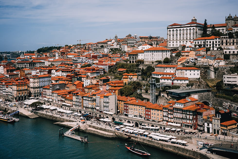 Layers of houses and building on the banks of Porto in Portugal