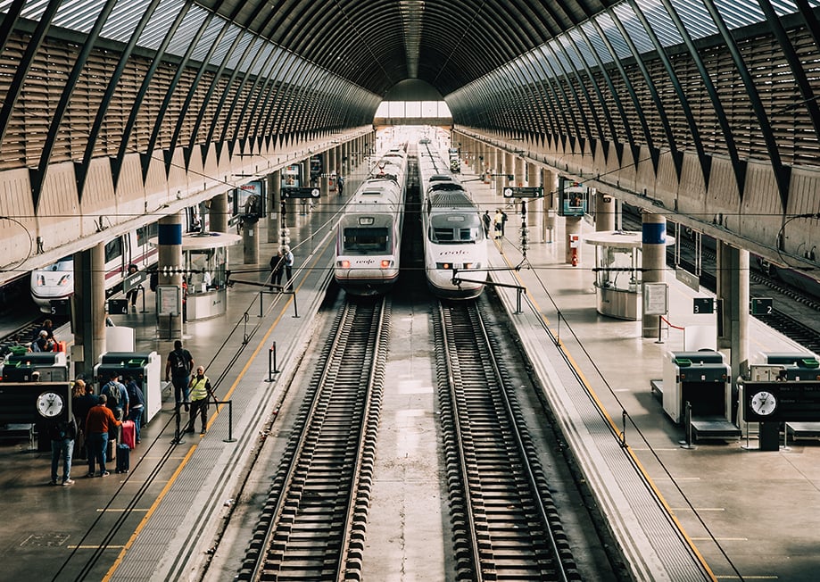 Trains pulling into a station