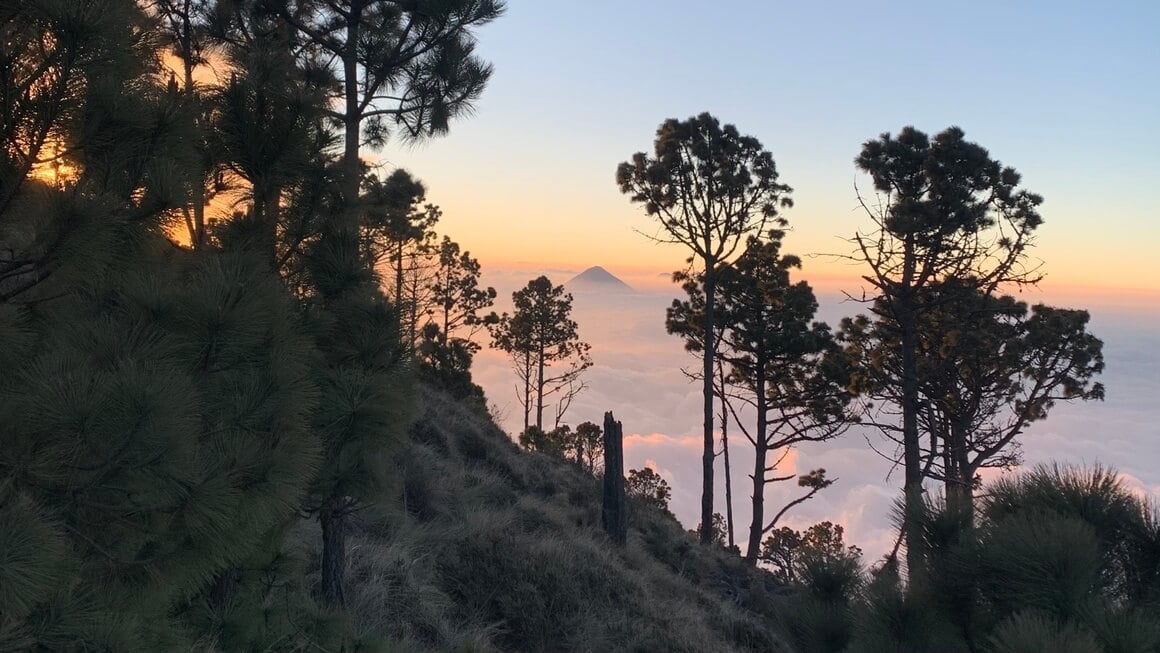 Volcano in the distance at sunset in Guatemala