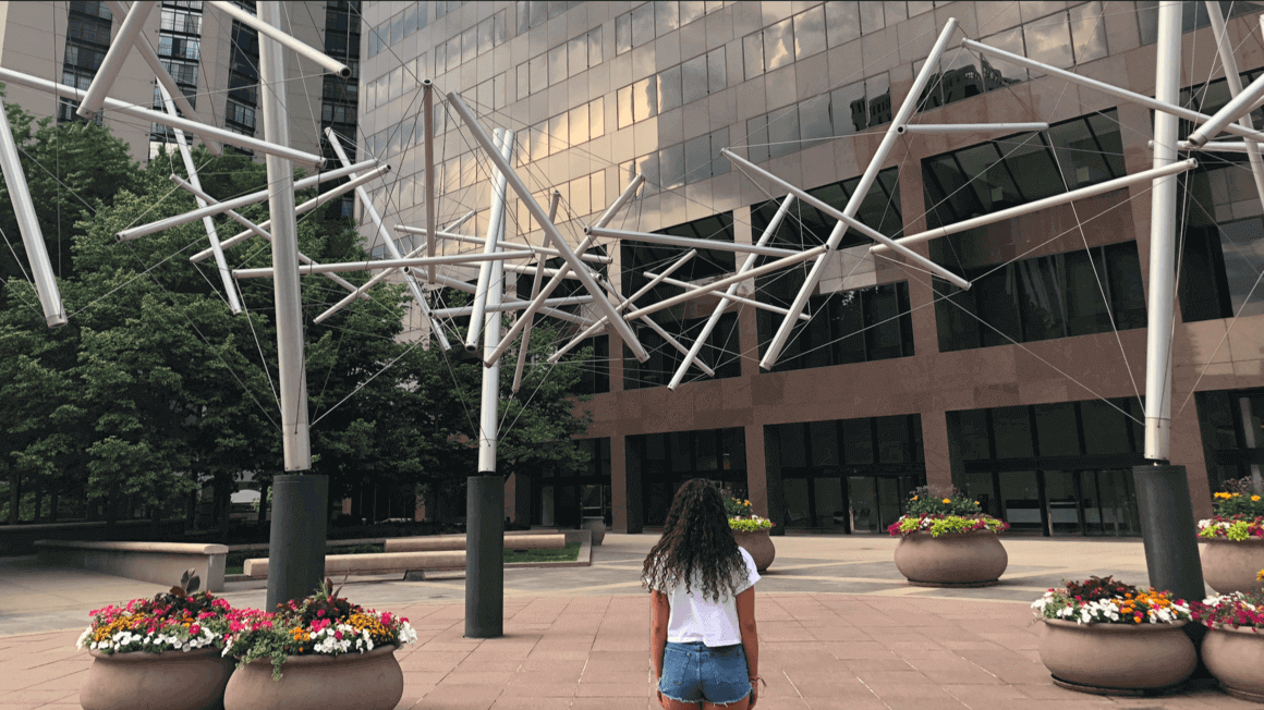 girl looking at building in Denver, Colorado 