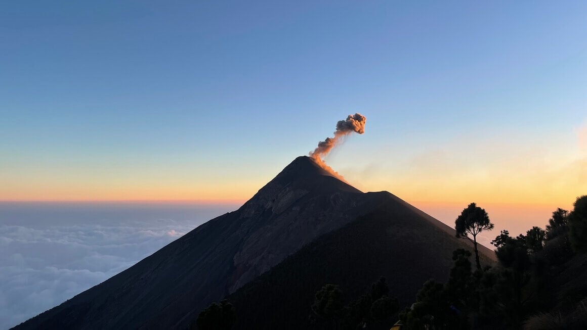 acatenango and fuego volcano at sunrise in guatemala
