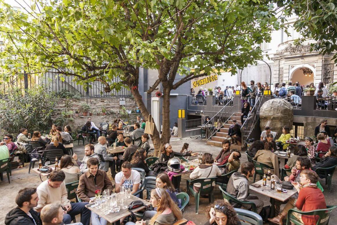 A group of people gathered in Antic Teatre Bar