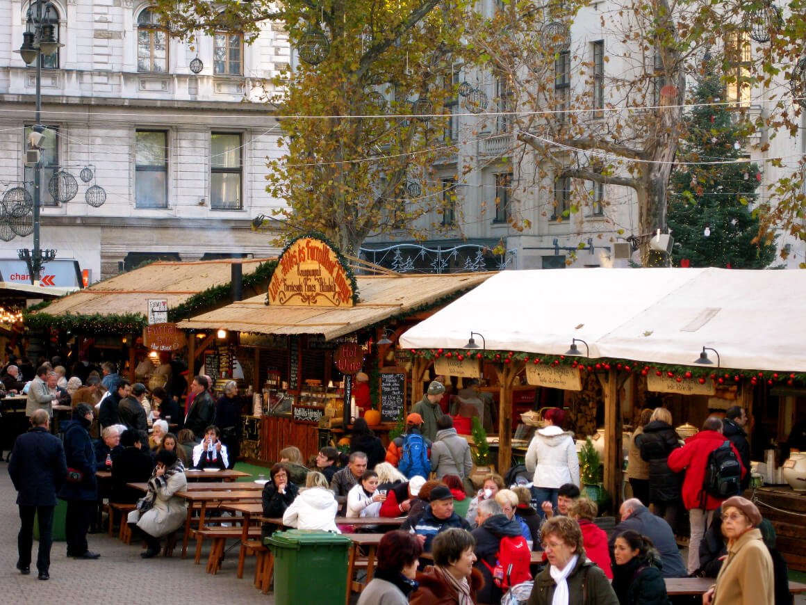 people gathered around local shops during Christmas Fair and Winter Festival
