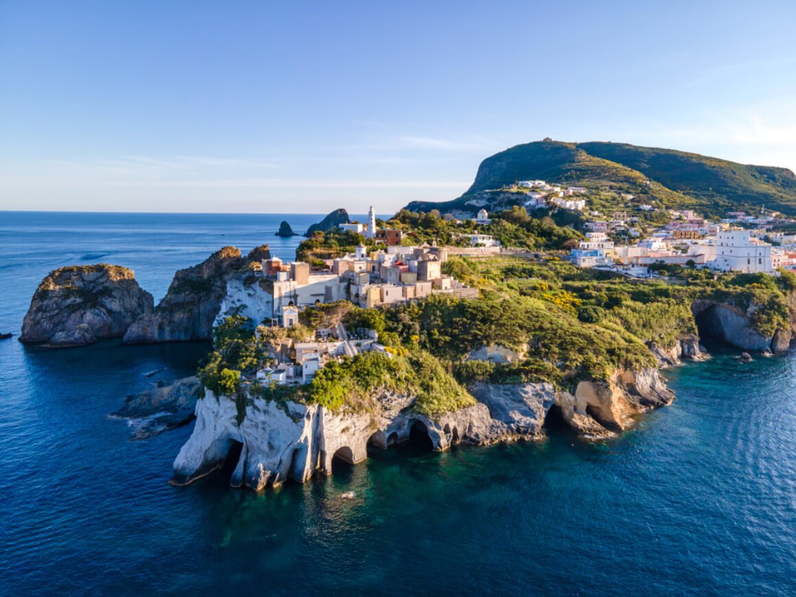 A town with white buildings on a rocky island, surrounded by the Mediterranean in Ponza Italy 