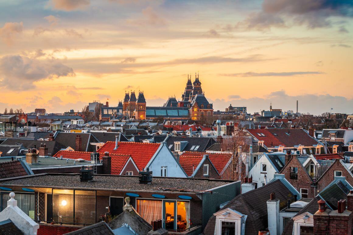 Group of houses with red roofs in De Pijp, Amsterdam