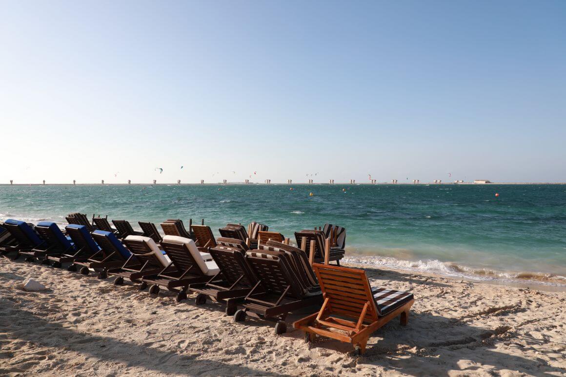 Lounge chairs lining at Jebel Ali Beach, Dubai 