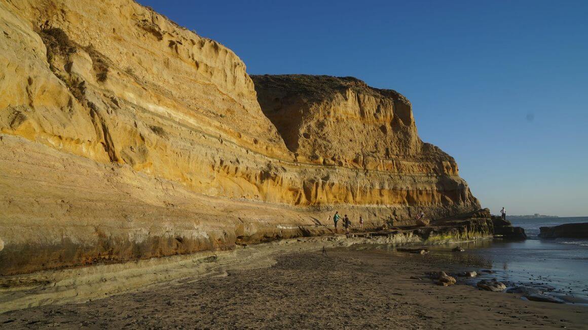 a rocky cliff overlooking a Black's Beach  in San Diago
