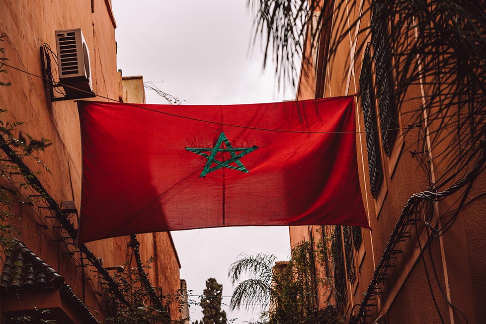 The Moroccan flag in a medina