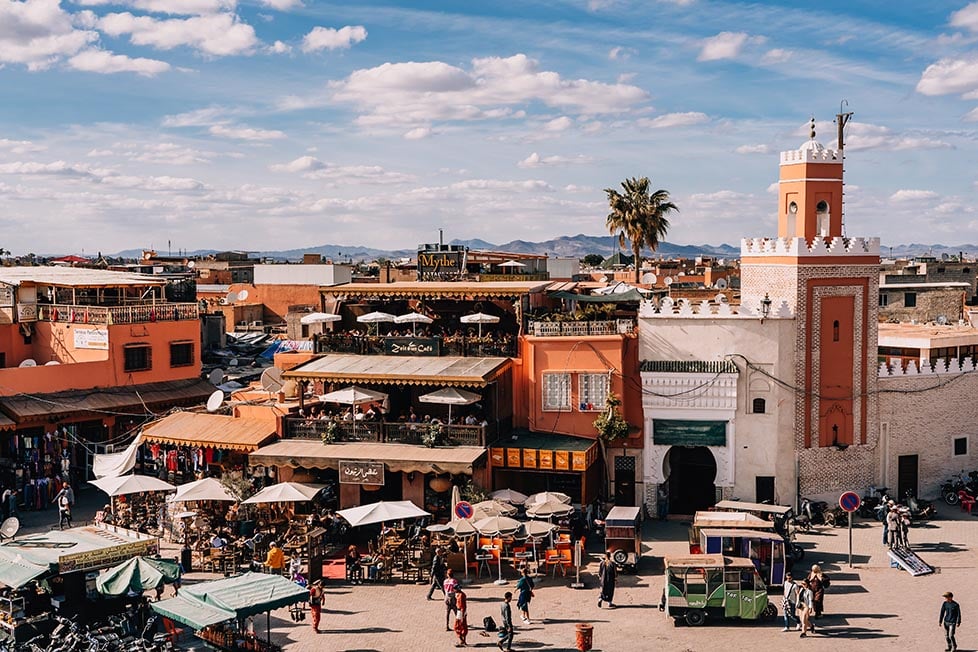 A large square and mosque in Marrakech, Morocco.