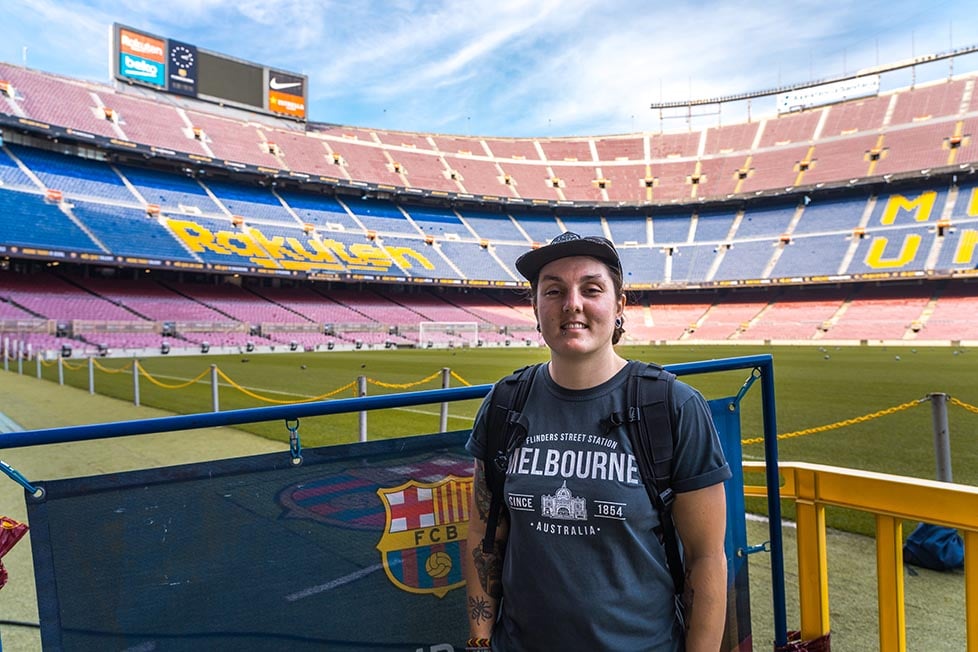 A person visiting The Nou Camp football stadium in Barcelona