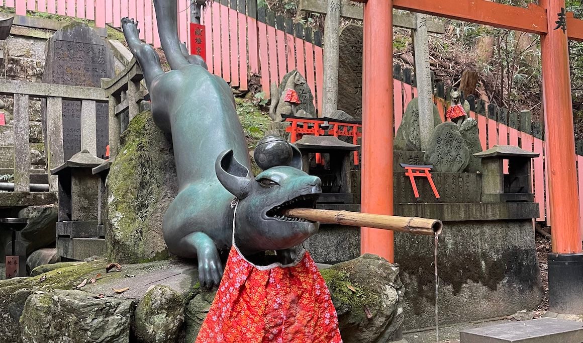 Fox water fountain at a temple in Kyoto, Japan.