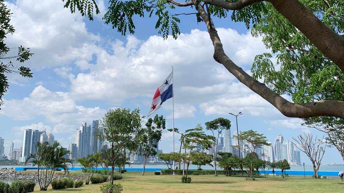 Panama city waterfront with the flag