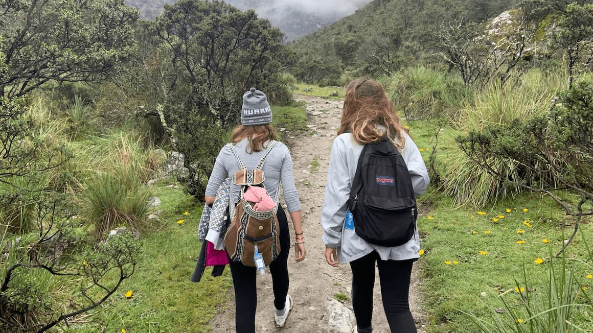 two girls that are hiking in peru 