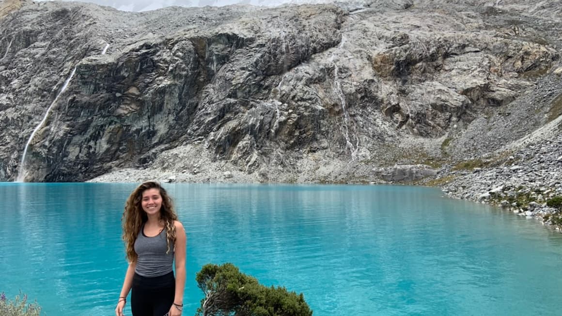 a lake in Peru with a view of the mountains 