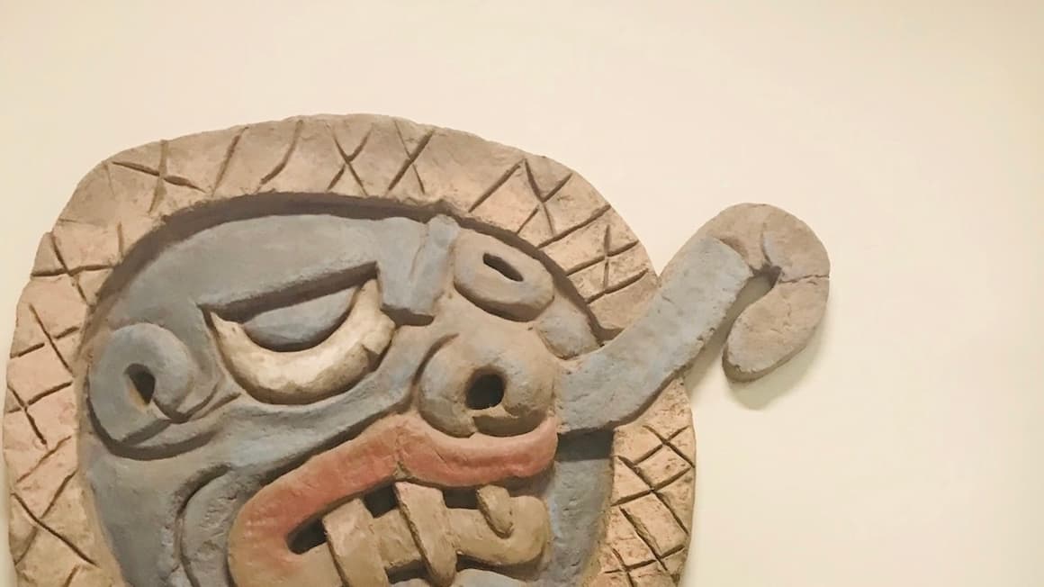 a statue in a museum in peru