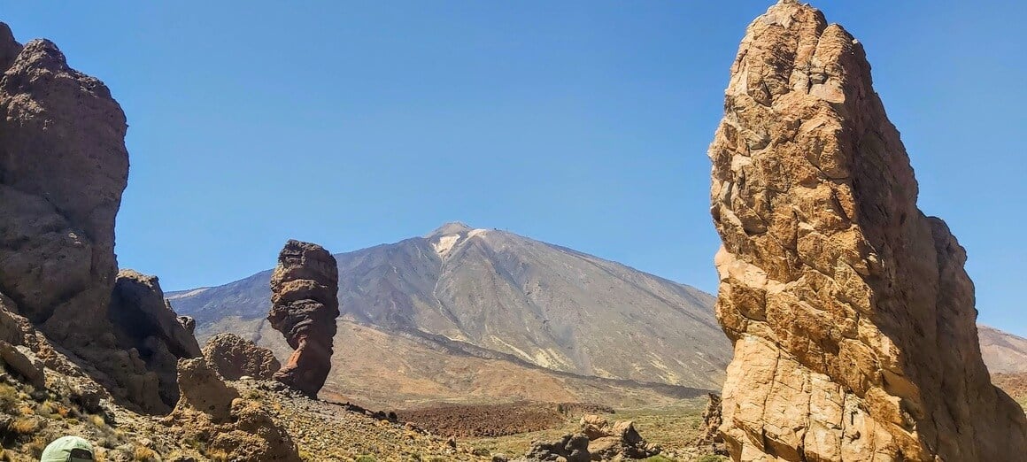 Los Roques de Garcia with El Teide volcano behind on a sunny afternoon. 