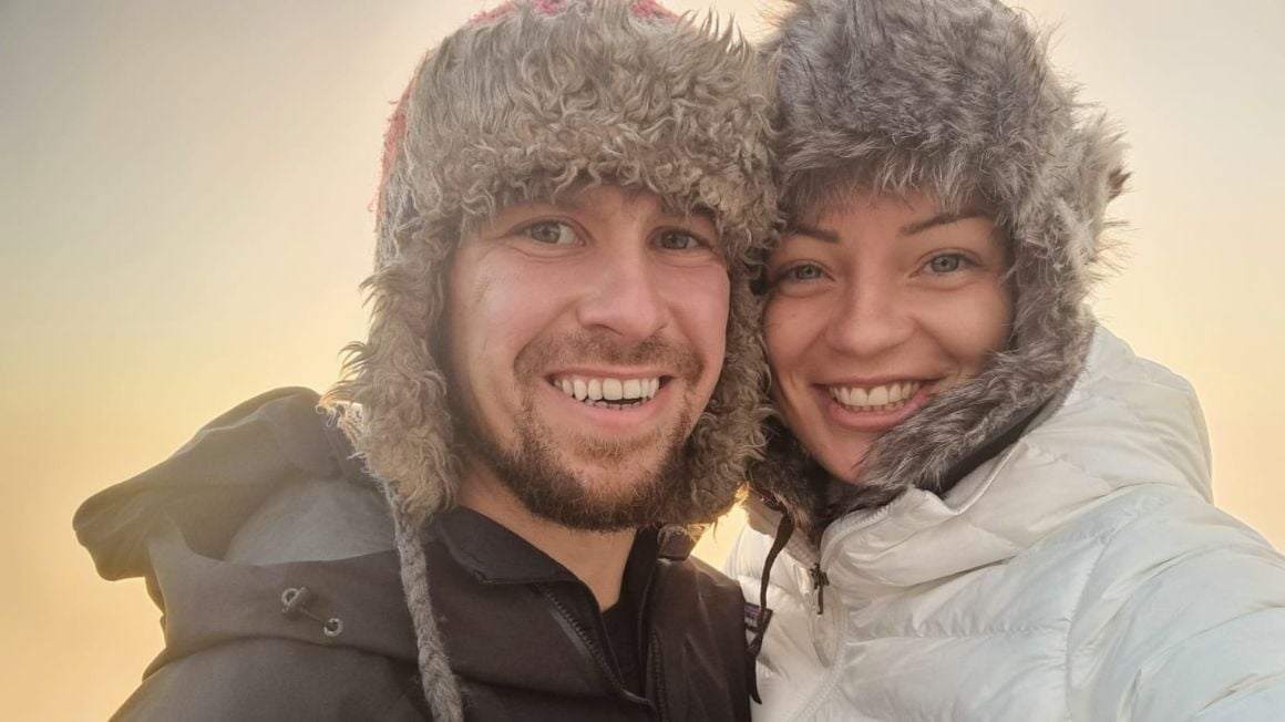 Will and Carrie smiling wearing winter clothes