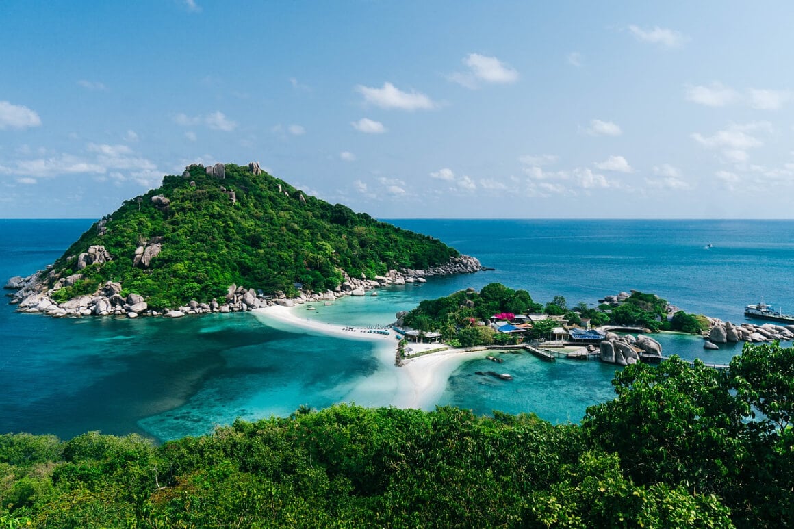 Koh Tao island in the middle of the ocean with turquoise water and a white sand beach