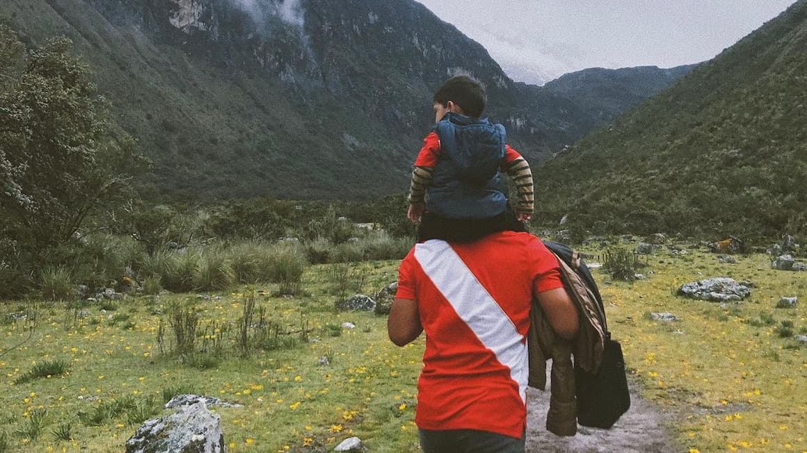father and son hiking the mountains of peru 