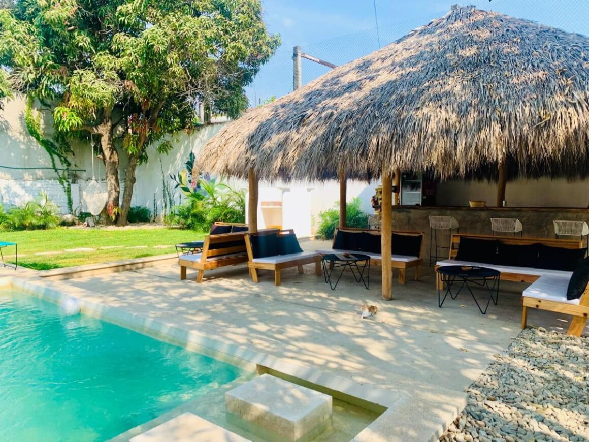 Colorada House pool area featuring a small garden and a seating area 