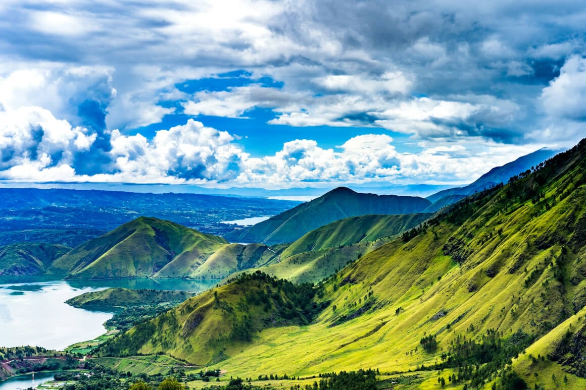 Lake Toba surrounded by green mountains in North Sumatra