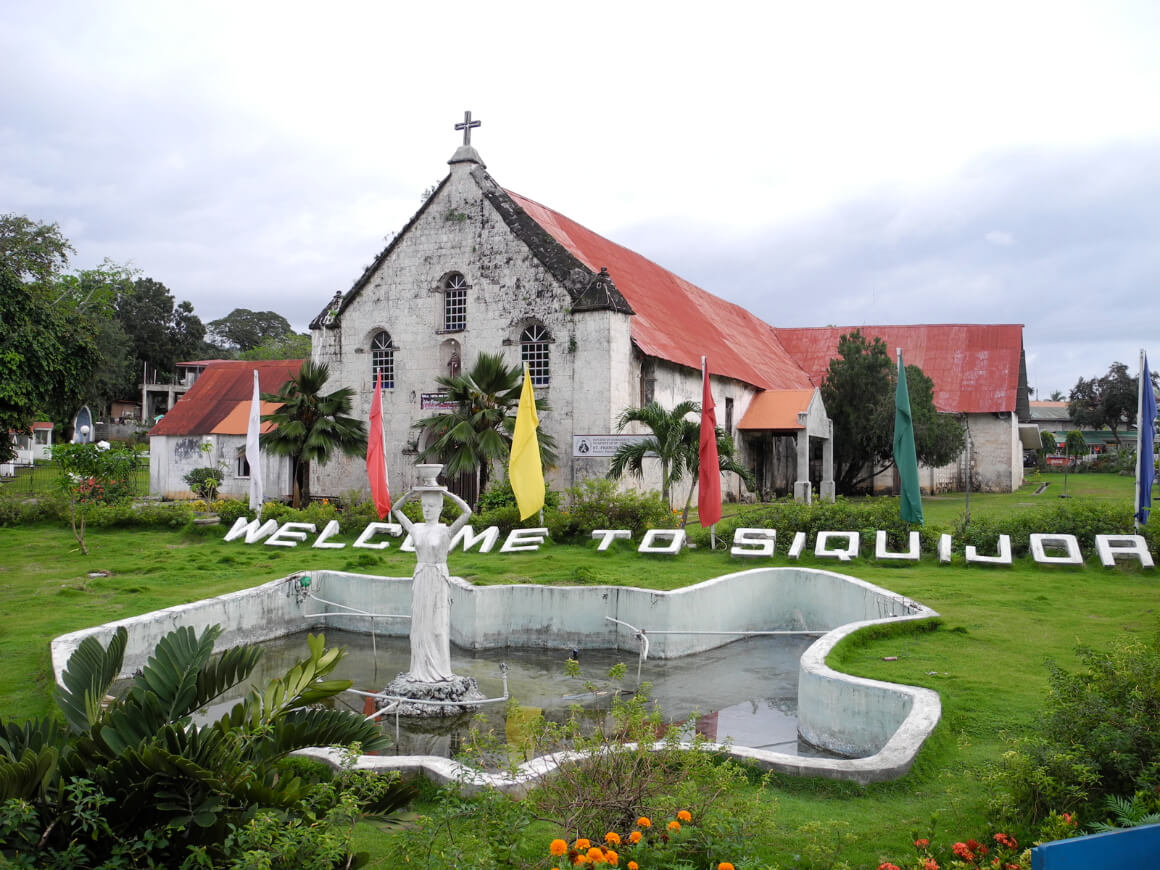The Welcome Siquijor Sign right in front of the St. Francis de Assisi Church in Siquijor Town