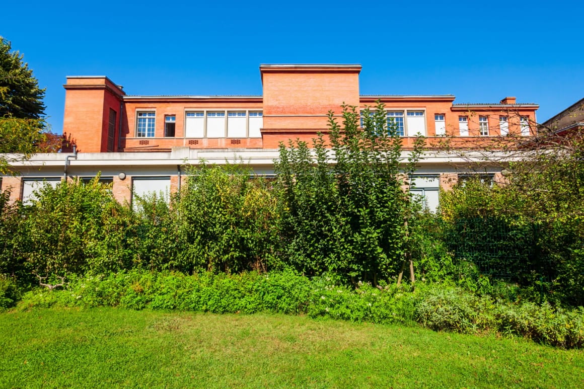 Museum de Toulouse surrounded by lush greenery