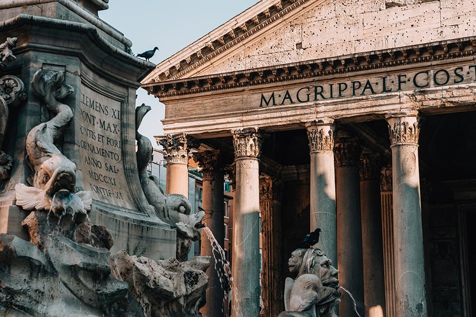 The Pantheon columns with the fountain in the square in the foreground, Rome, Italy