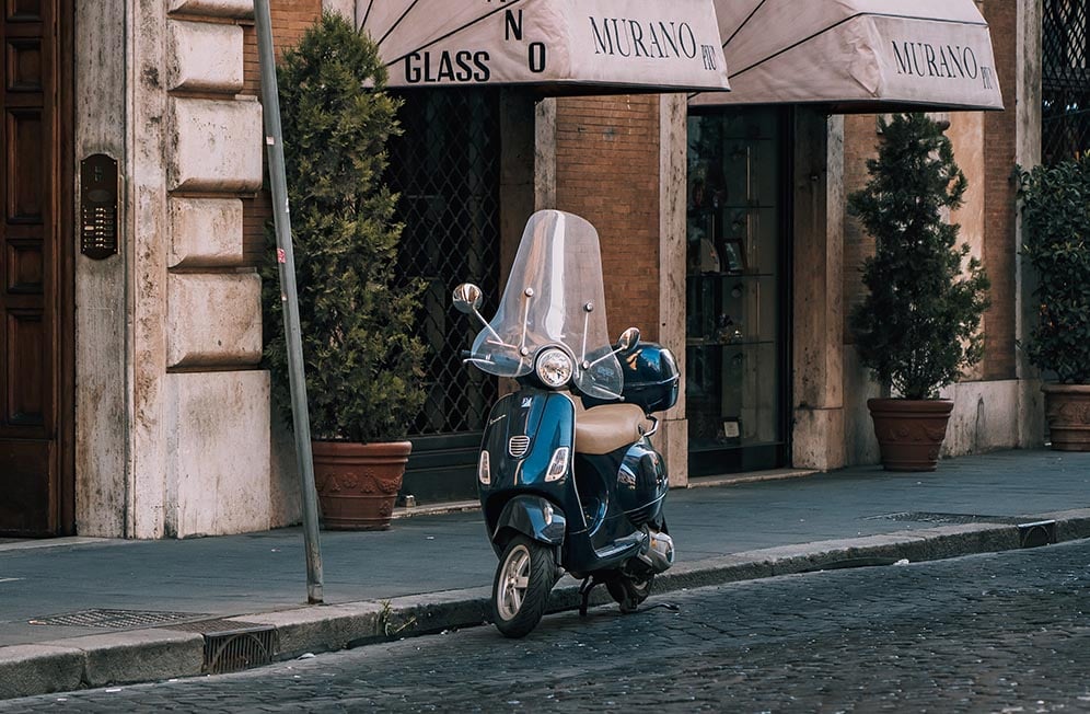 A vespa scooter on the streets in Rome, Italy